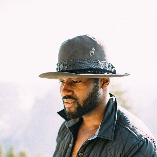 Man in a Cowboy Hat - photo by Nathan Dumlao