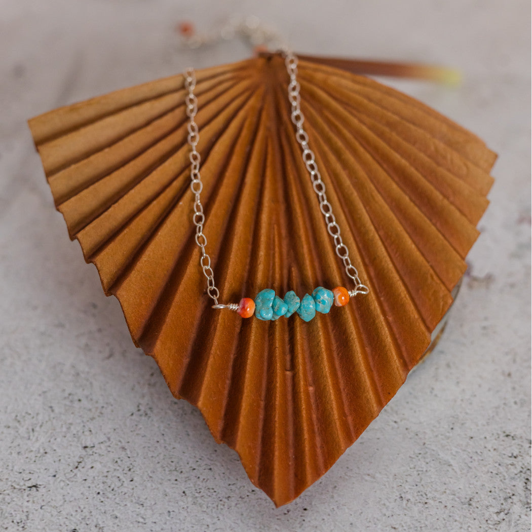 Turquoise and spiny oyster necklace closeup