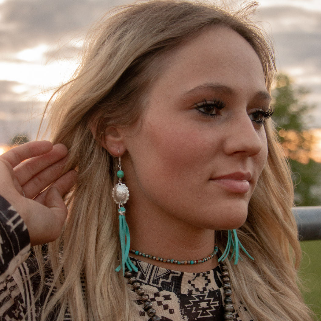 Silver concho earrings with turquoise and leather fringe - color bluebird