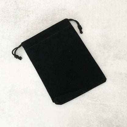 Black jewelry pouch with anti-tarnish interior