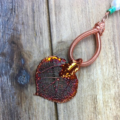 Detail of copper aspen leaf necklace with pearls
