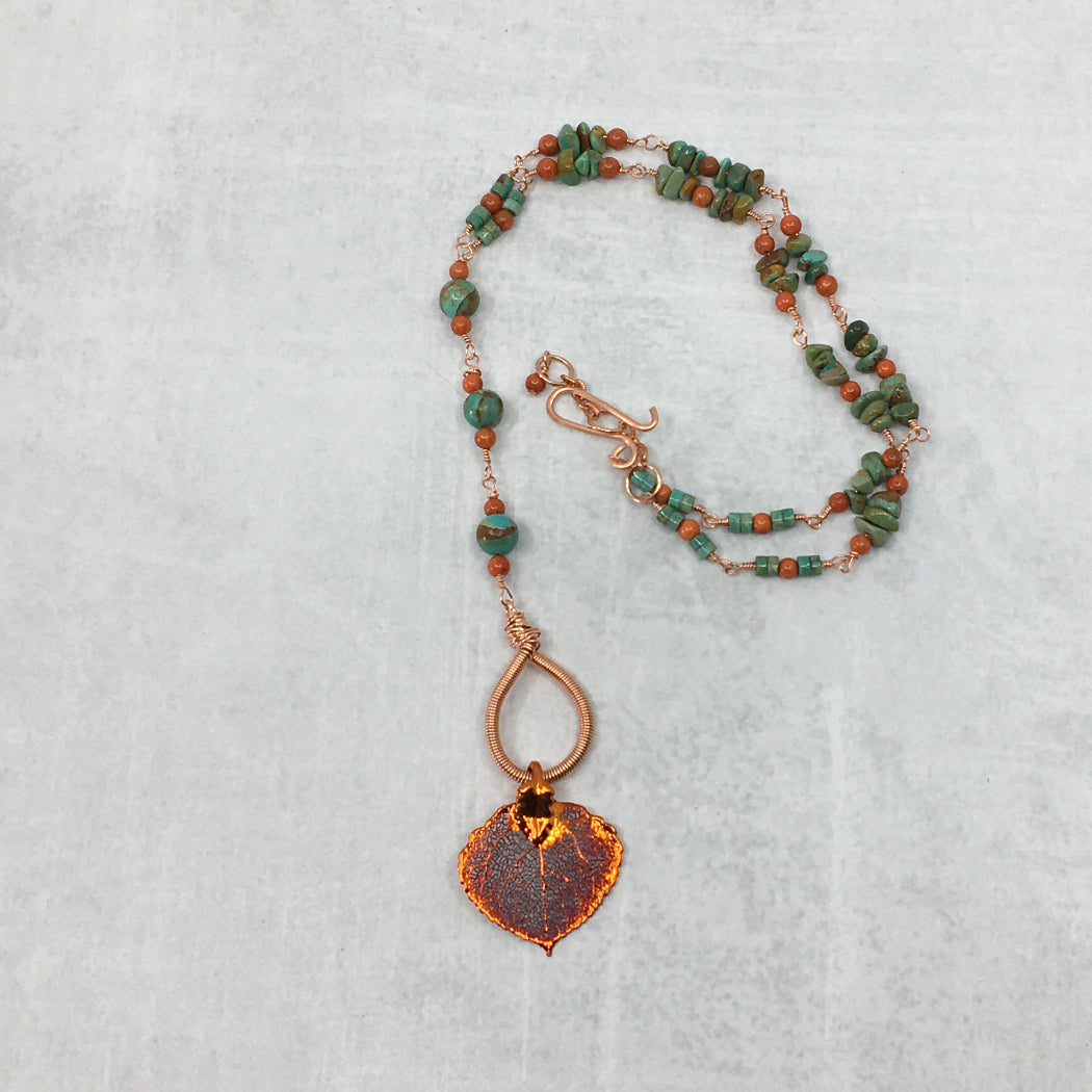 Turquoise and coral necklace with real aspen leaf pendant dipped in copper