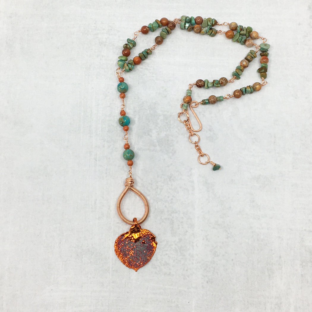 Turquoise and jasper necklace with real aspen leaf pendand dipped in copper