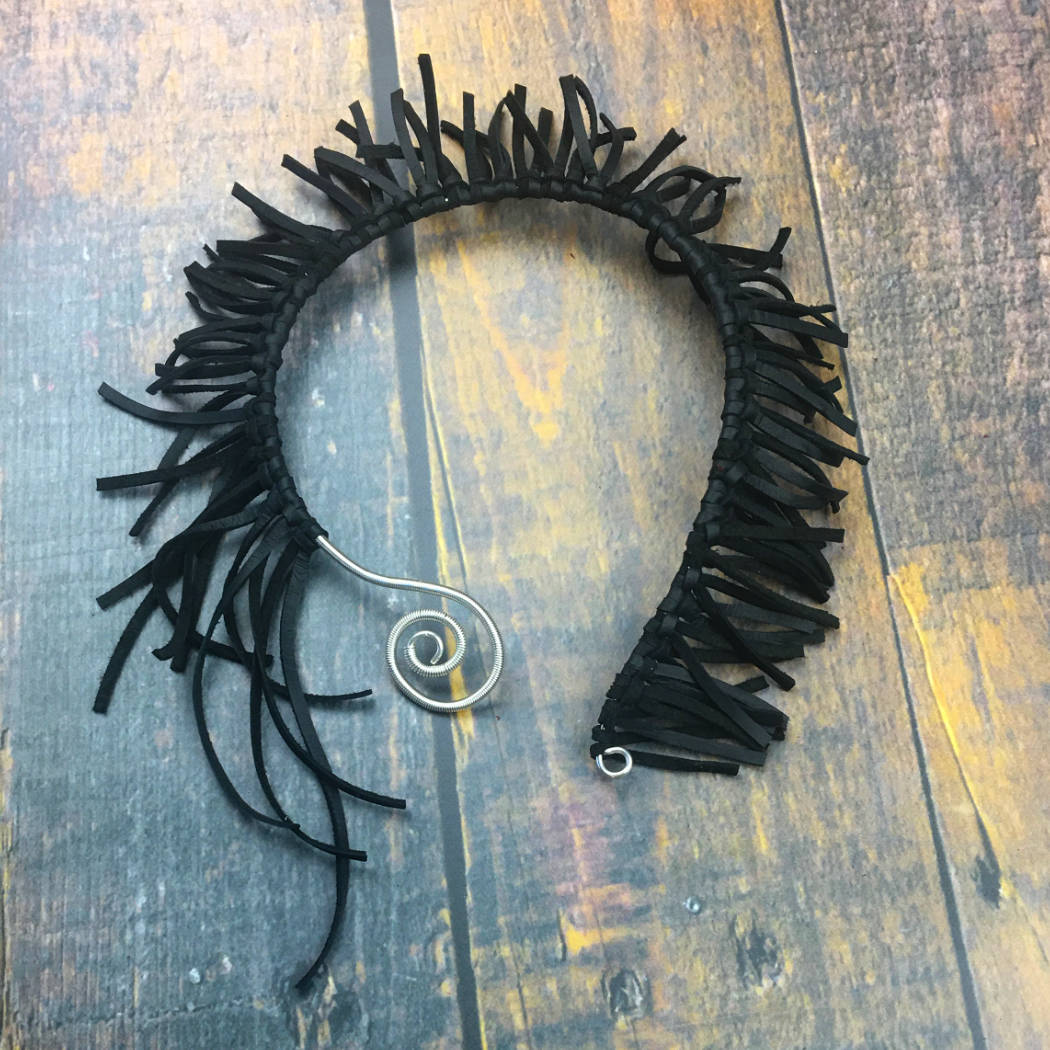 Silver statement necklace with black leather