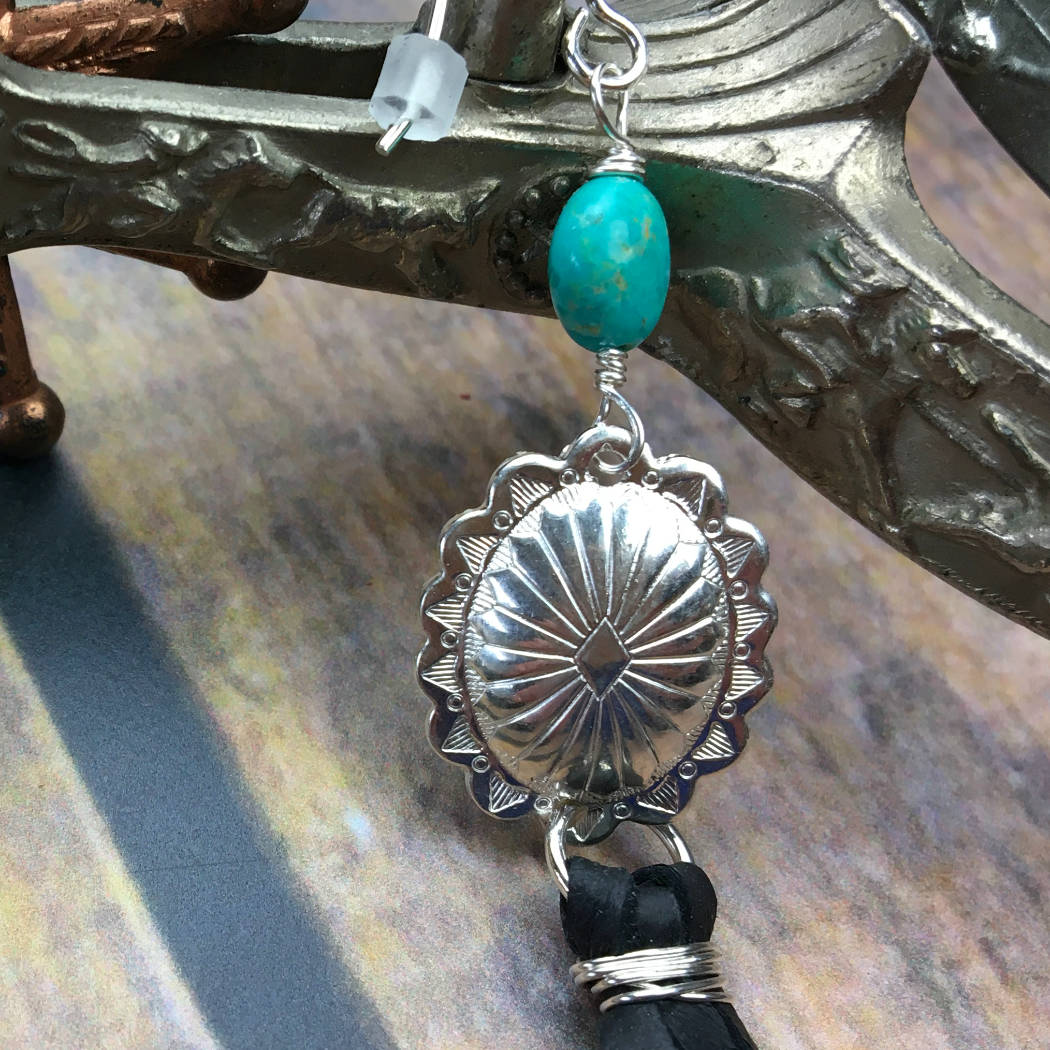 Detail of western style turquoise earrings